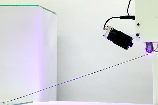 Additive manufacturing of carbon fiber-reinforced thermoset composites via in-situ thermal curing